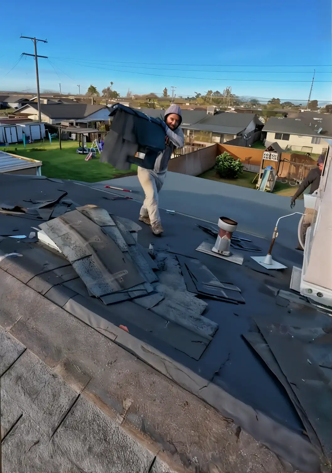 Roofing crew in action. Cali Tile offers Roofing services.
